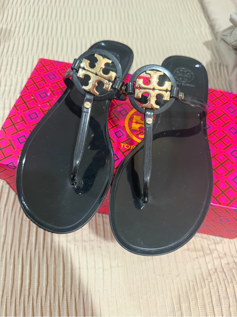 Tory Burch Black Jelly Thong Sandals with Gold Logo Medallion